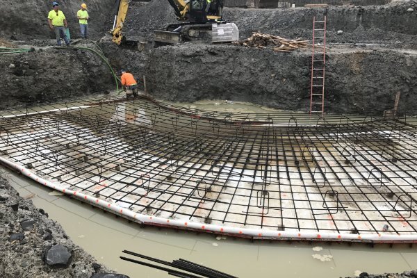 Reinforcing steel rebar placement for structural concrete foundation in Massachusetts